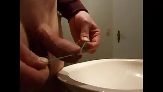 foreskin stretching widely from peeing