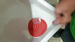 guy with uncut horseshit pees in public then plays with horseshit